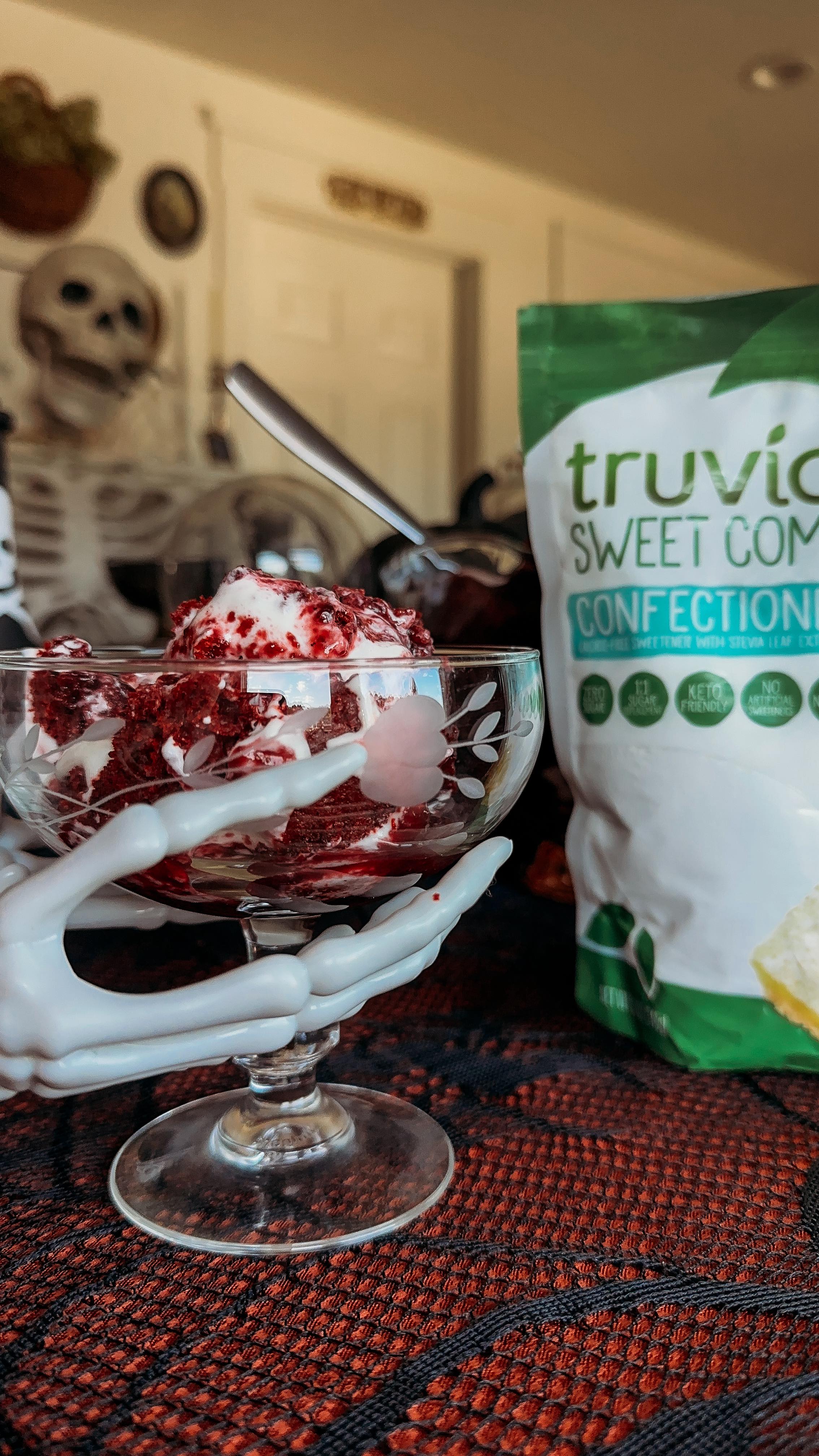 Instagram post by @therurallegend for Truvia. Caption reads: While this Blood-Red Velvet Trifle looks....