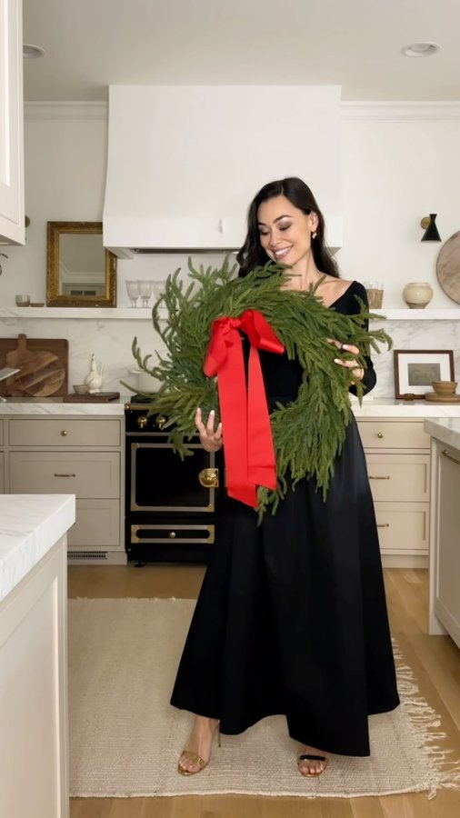 Instagram post by @katjamieson_ for Mizzen+Main. Caption reads: Decorating our kitchen for the holidays! 🎄❤️....