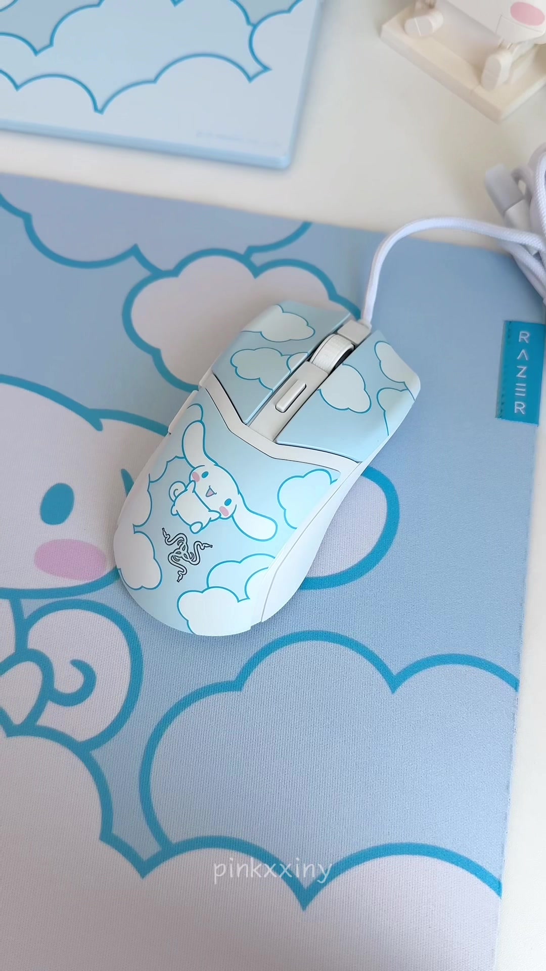 TikTok post by @pinkxxiny for Razer. Caption reads: razer x cinnamoroll 🩵☁️ it’s the cutest [...].