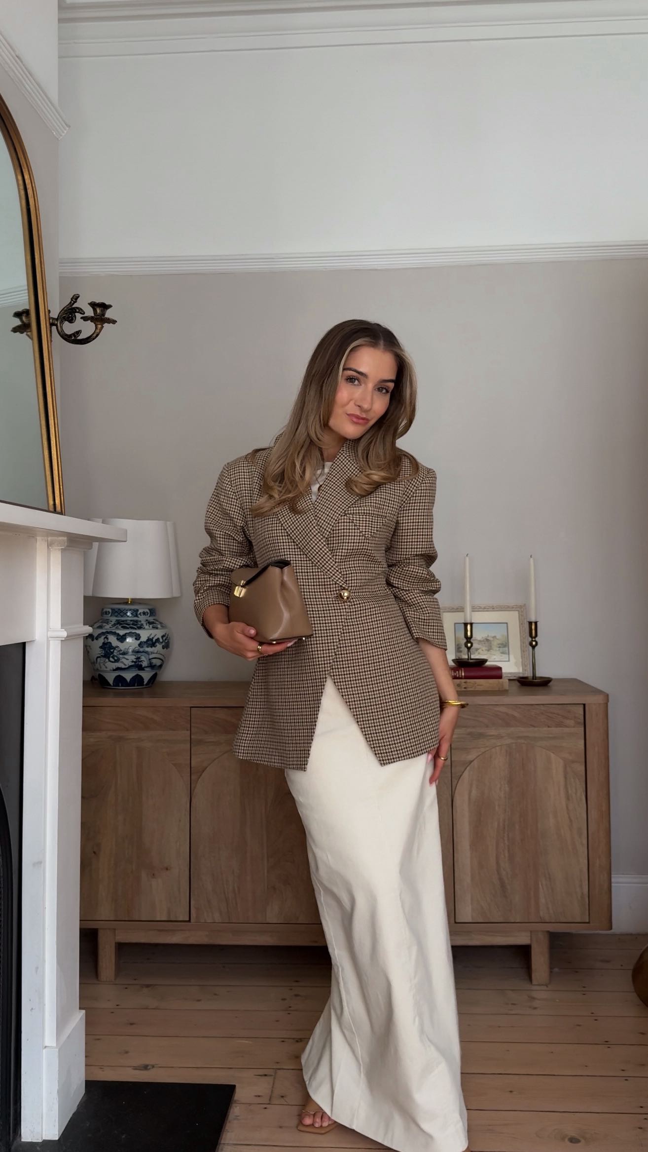 Instagram post by @lilyisabellaclark for LilySilk. Caption reads: A transitional date night outfit 🤎 the autumn....