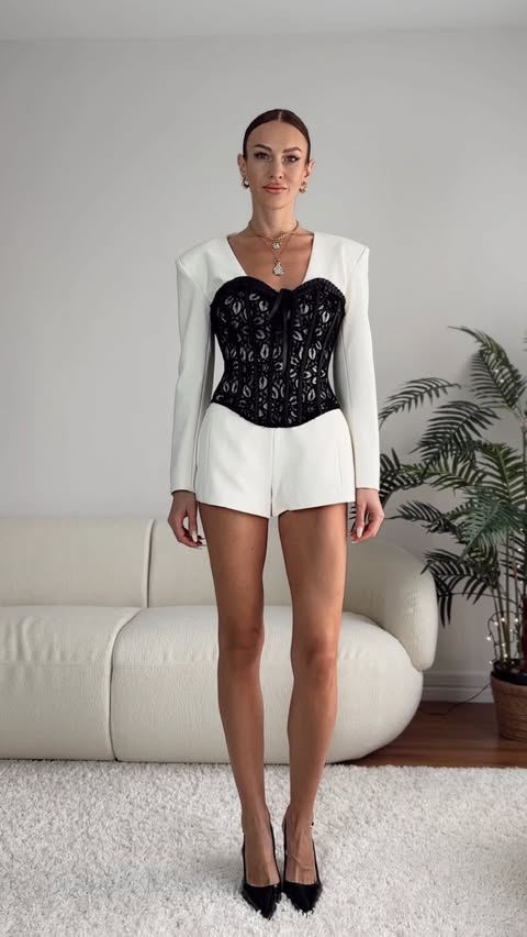 Instagram post by @iryna.flori for ZARA. Caption reads: @zara but make it couture 🤍🖤 This lace corset....