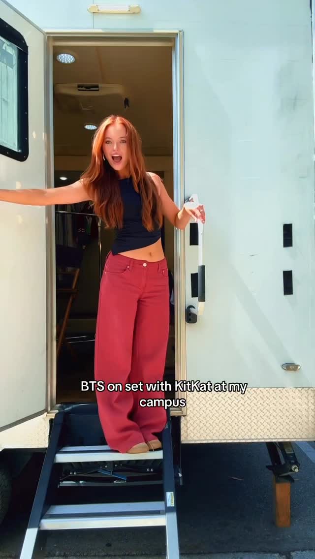 Instagram post by @sharlizetrue_ for KitKat. Caption reads: Come BTS on set with the KIT KAT® Break Squad....