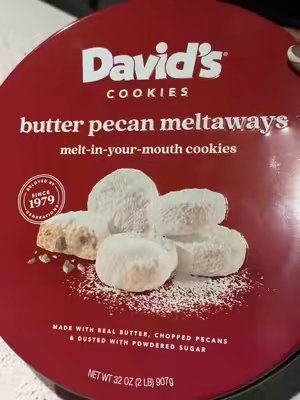 TikTok post by @mala_sweets for David's Cookies. Caption reads: [...] they were delicious #foodreview....