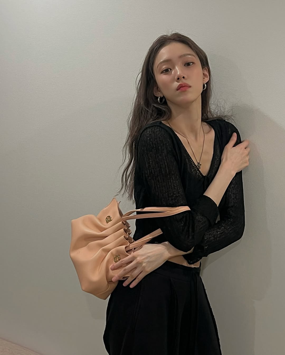Instagram post by @heybiblee for FERRAGAMO. Caption reads: 🌸🍦🩷 @ferragamo....