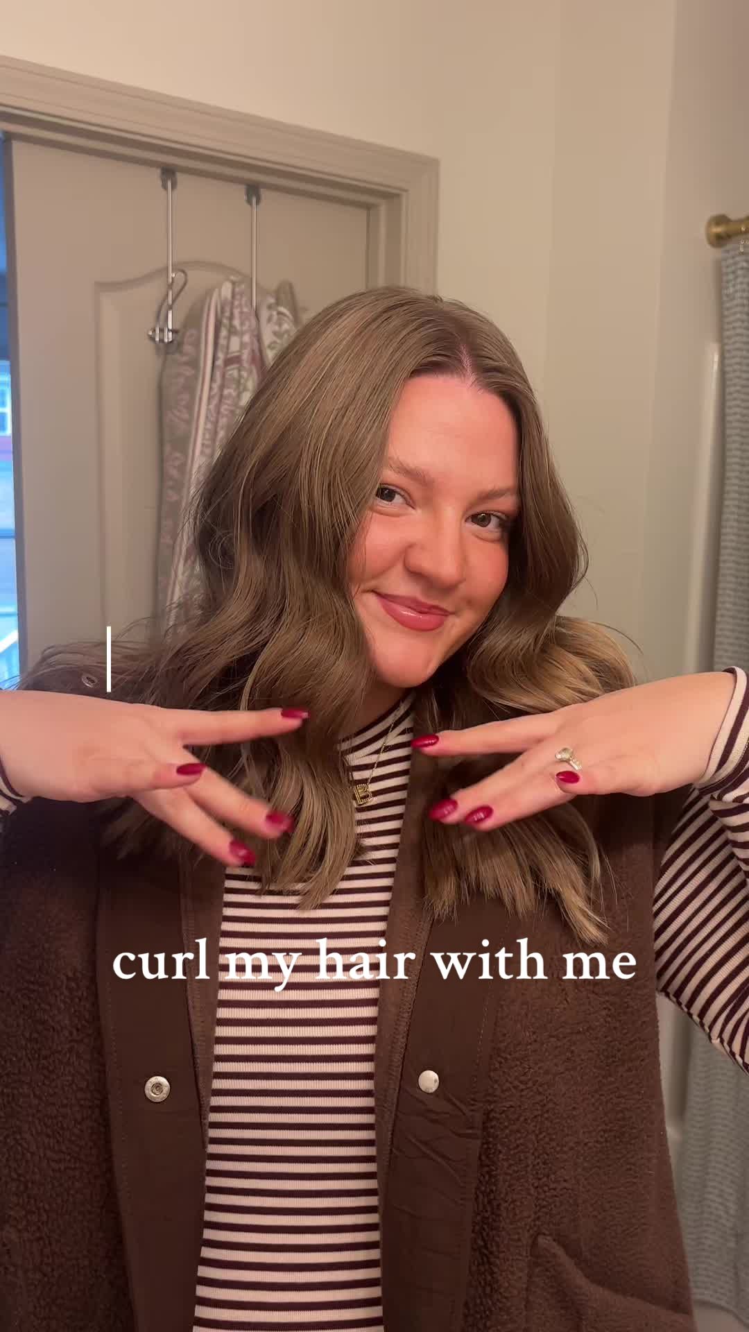 TikTok post by @ally.bailey33 for L'ange Hair. Caption reads: been loving my @langehair flat iron for my curls!!....