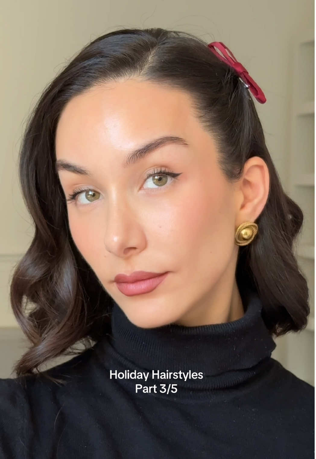 TikTok post by @melisekrem for Living Proof. Caption reads: Holiday Hairstyles: Part 3/5 ❄️ this easy side....