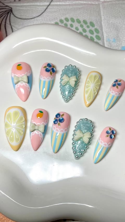 Instagram post by @cxh.nails for Beetles Gel Polish. Caption reads: [...] with me for spring 🫐🍋 Using....