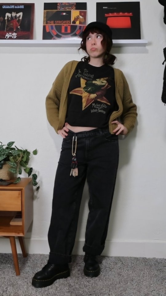 Instagram post by @thrift.rat for Tradlands. Caption reads: *we all nod in unison*

cardigan @tradlands....