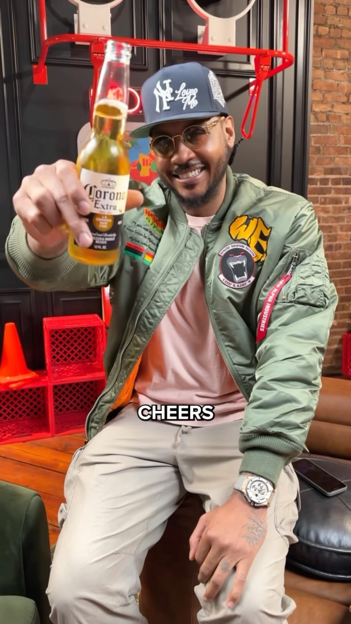Instagram post by @carmeloanthony for Corona USA. Caption reads: To this weekend’s hoopers 🫡
For 21+.....