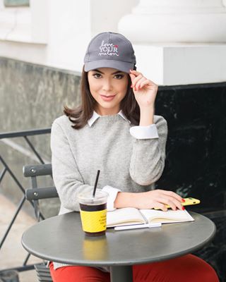 Instagram post by @noelle for Love Your Melon. Caption reads: Quick coffee break in my new @loveyourmelon hat!....