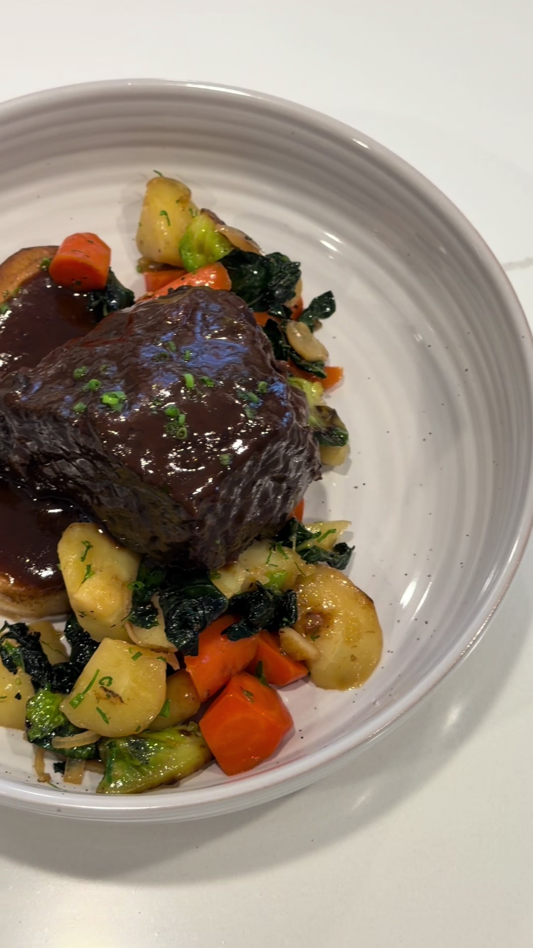 TikTok post by @chrisviaud for Caraway Home. Caption reads: What better way to warm up during our first long....