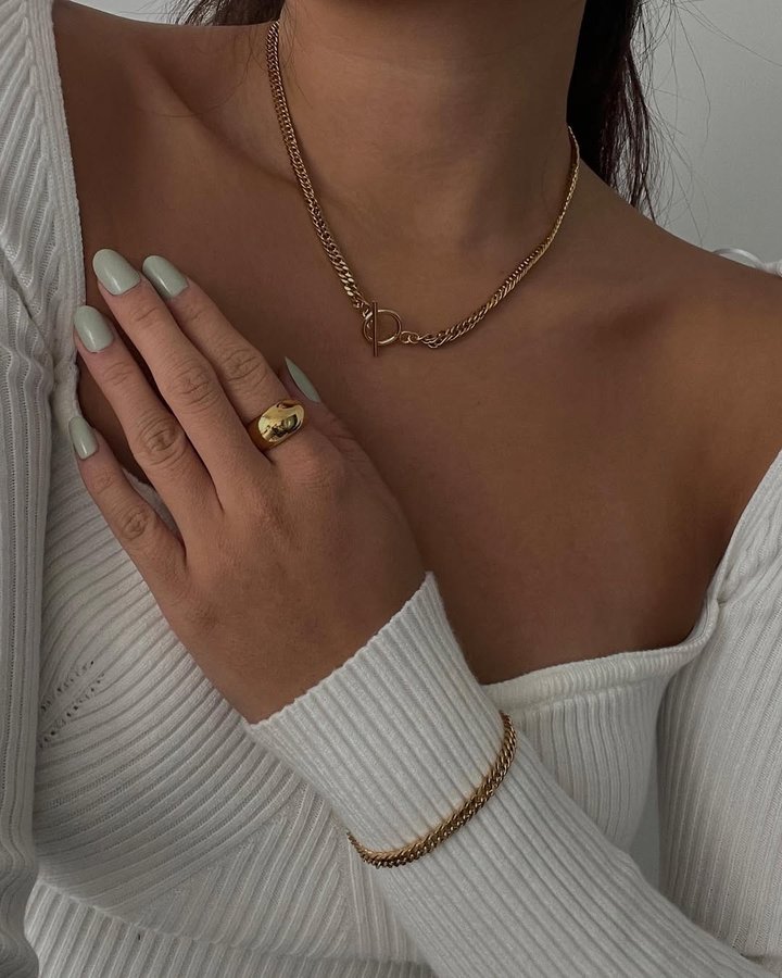 Instagram post by @genevivelaurenn for Twenty Compass. Caption reads: [...] month, let me know your top ones🥰....