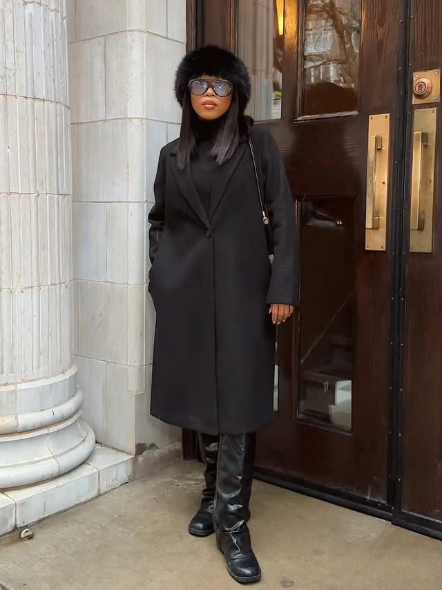 Instagram post by @lwethu_mcusi for JustFab. Caption reads: Been layering up

Coat | ZARA 
Boats |....