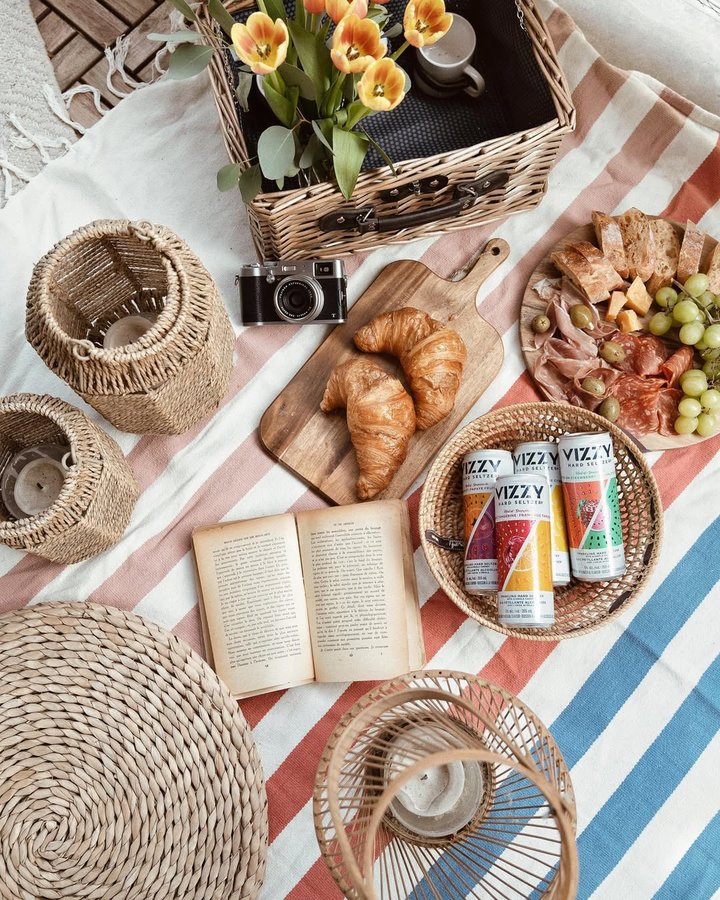 Instagram post by @andrewcretaro for LCBO. Caption reads: Indulge in the ultimate summer picnic experience,....