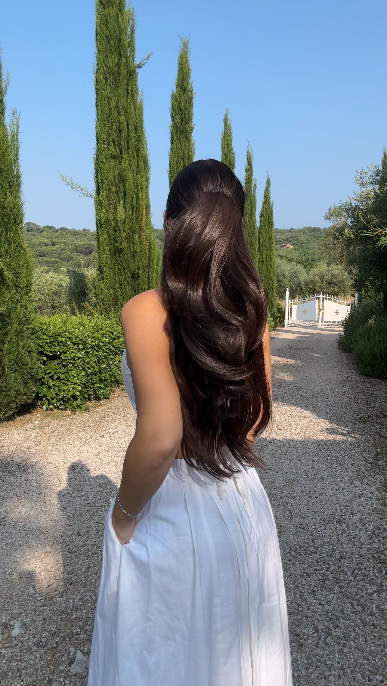 Instagram post by @laurajaynesmith for LullaBellz. Caption reads: Euro summer hair & this is my fave! 🌸🫶🏼💕.