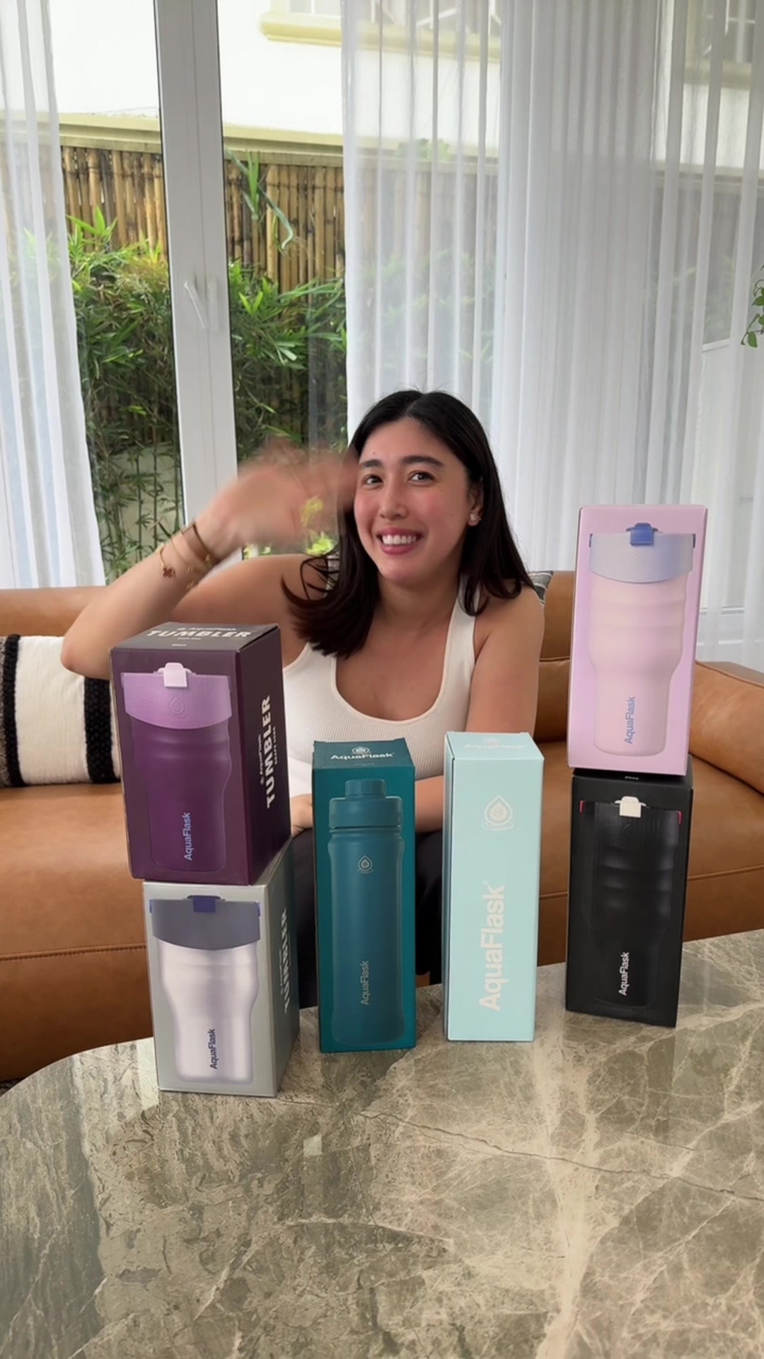 TikTok post by @danibarrettop for AquaFlask. Caption reads: I’m going live with @AquaFlask Philippines....