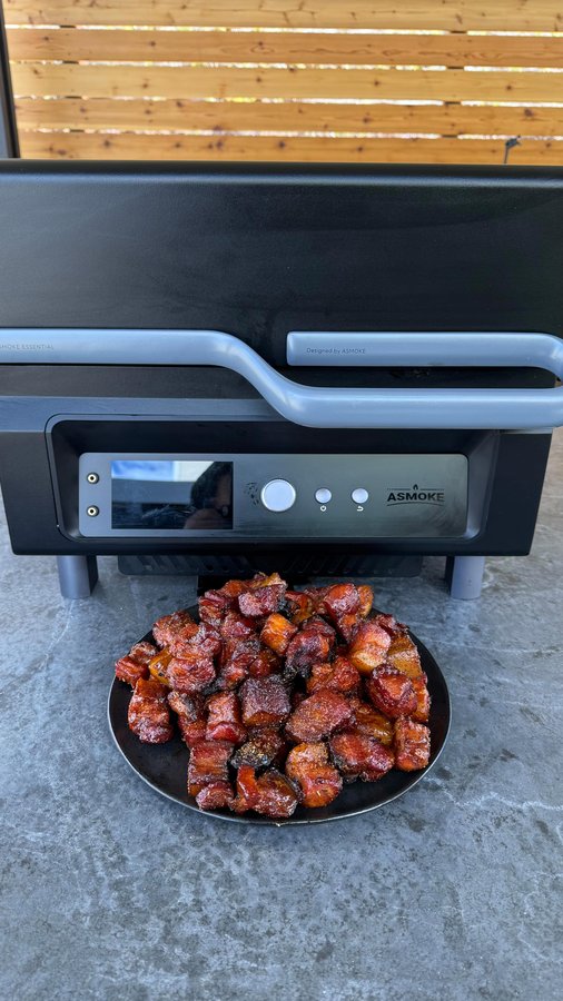 Instagram post by @cooking_with_fire___ for Asmoke Grill. Caption reads: [...] 🔥Just dropped my new go-to grill—the....