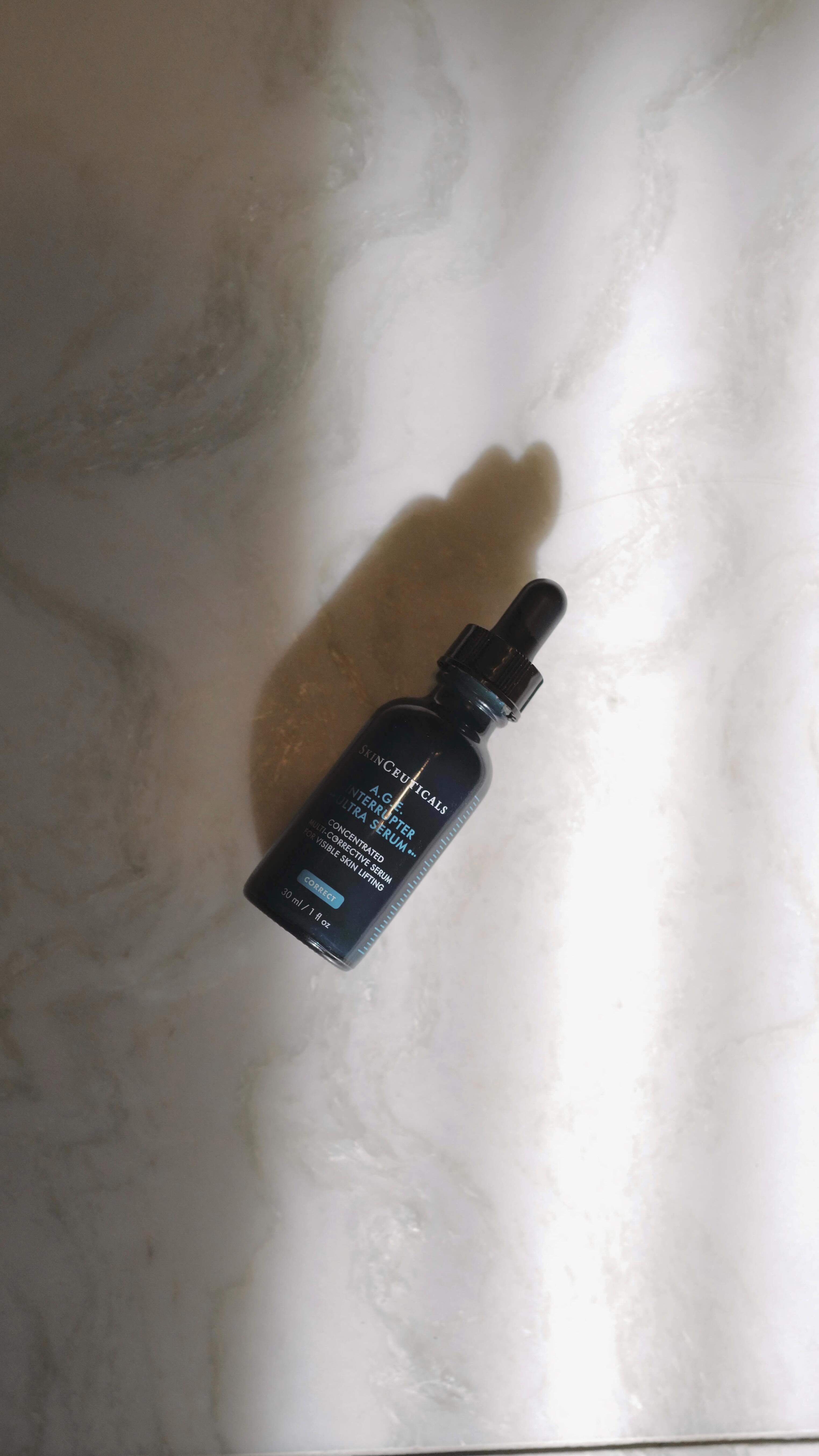 Instagram post by @kayebassey for SkinCeuticals. Caption reads: Let’s get a lift together with @skinceuticals....