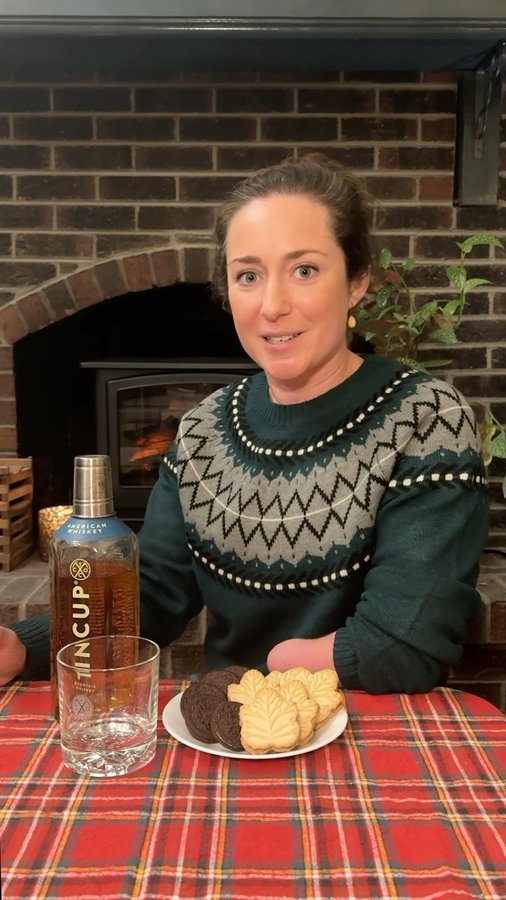 Instagram post by @mo.in.mountains for TINCUP Whiskey. Caption reads: [...] down your gullet is to dip them in....