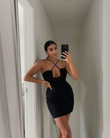 Instagram post by @charlotteemilysanders for MISSPAP. Caption reads: Very into dresses lately @misspap [ use code....