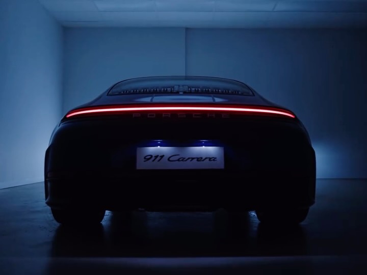 Instagram post by @lakotaajohnson for Porsche. Caption reads: Iconic and timeless. The all new Porsche 911....