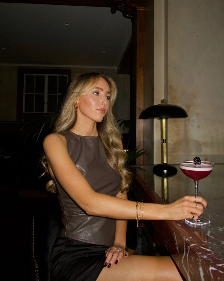 Instagram post by @oliviacharlotteburton for Lucky Cat. Caption reads: Evening out with my fave at....