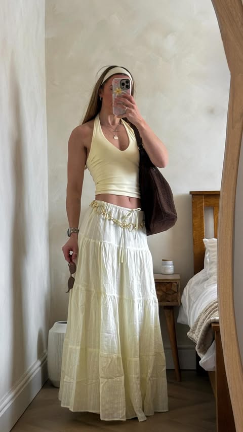 Instagram post by @rhiwanders for City Beach. Caption reads: [...] 🌞🍊🛵✈️🌴🍋 all outfits are from....