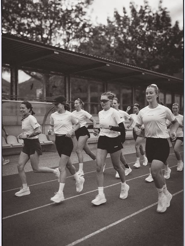 Instagram post by @katharinaannamaria for HOKA. Caption reads: [...] run club, track-n-trail together w/ @hoka_eu....