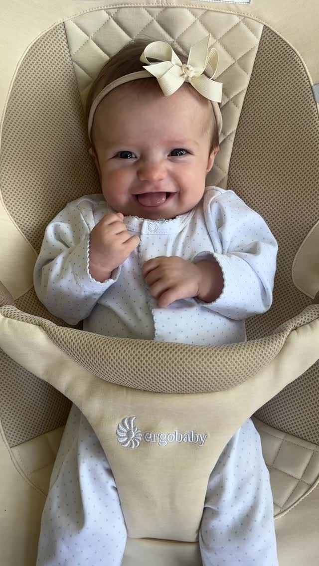 Instagram post by @sarahkateprice for Ergobaby. Caption reads: My hands and my heart have never been more full! I....