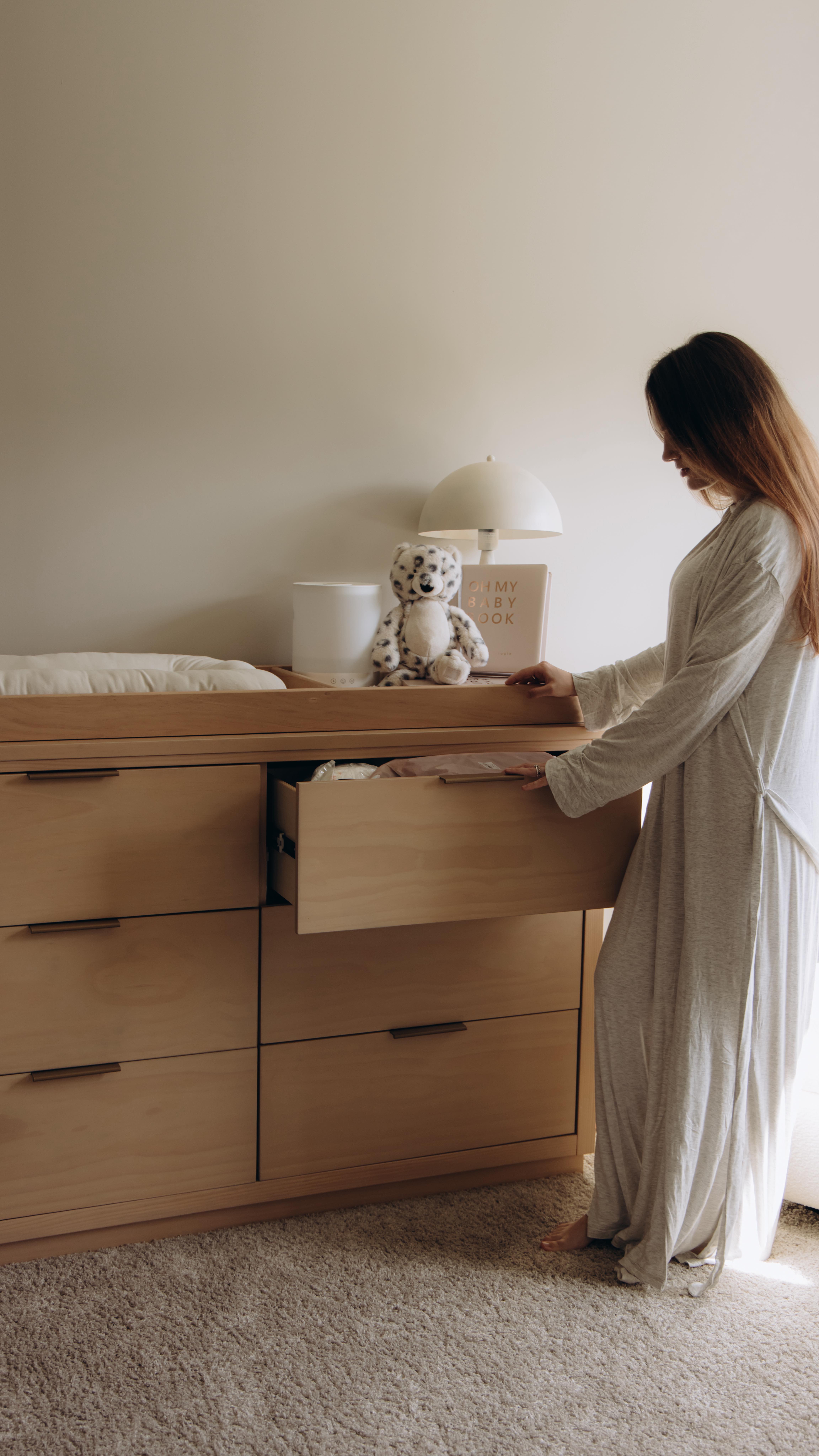 Instagram post by @romanovska_22 for Delta Children. Caption reads: Welcome to my dreamy nursery — and I couldn’t be....