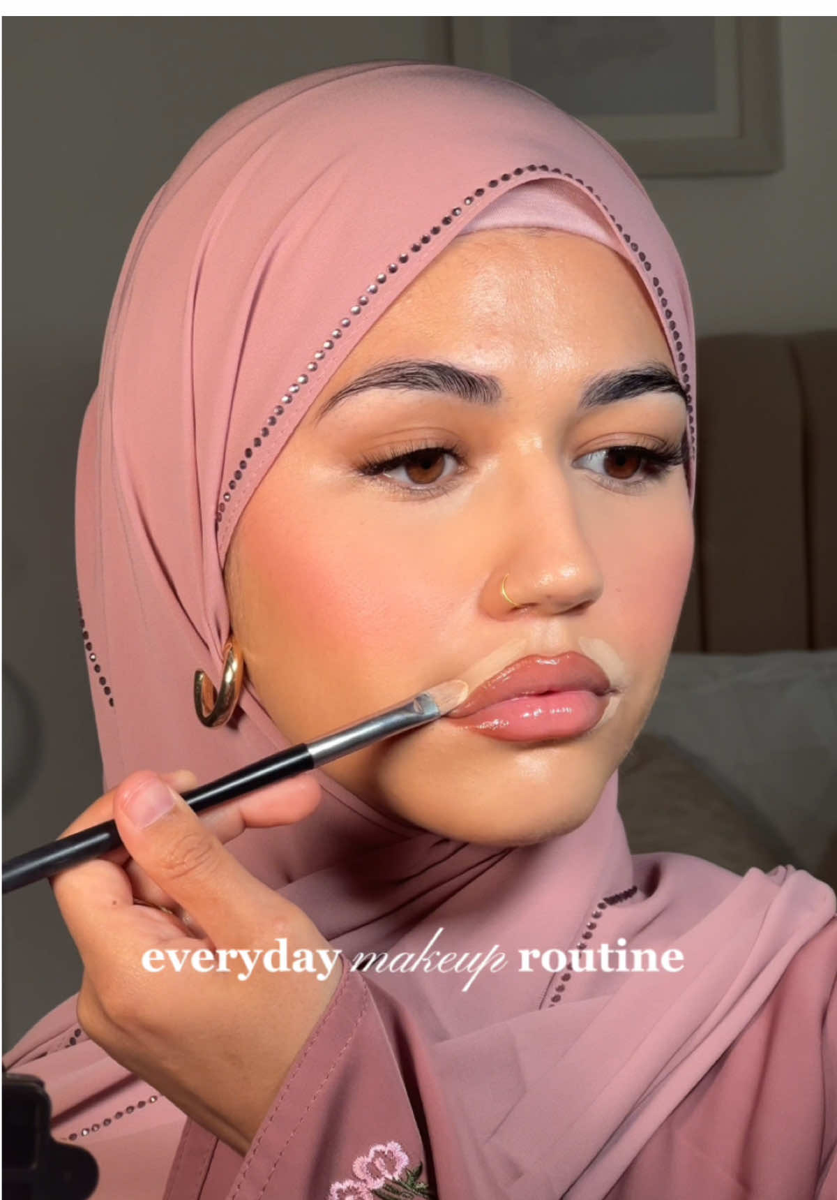 TikTok post by @zohral2 for HNB Cosmetics. Caption reads: 10 minute easy makeup 💗  • @Charlotte Tilbury....