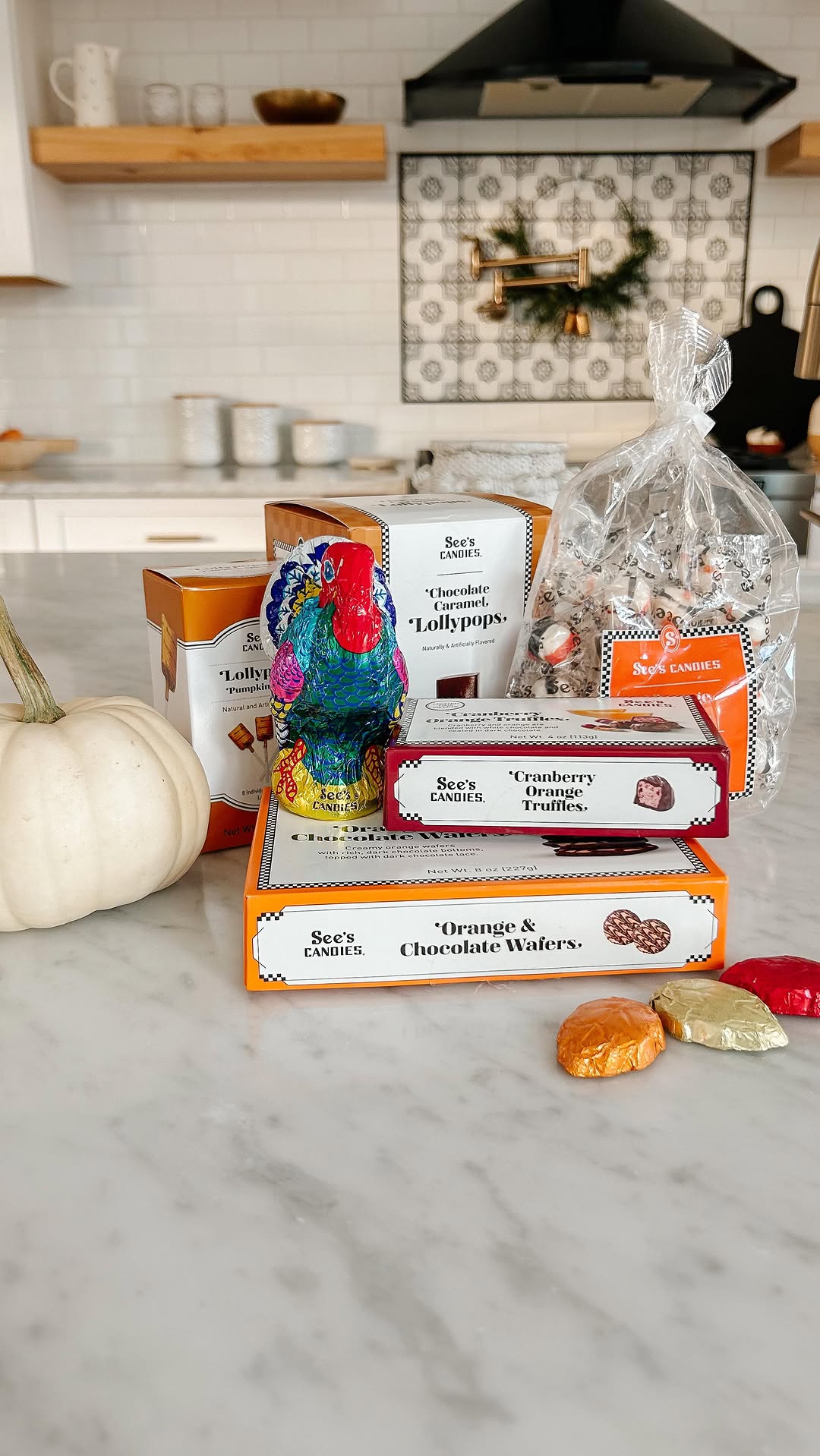 Instagram post by @ashwisdom for See's Candies. Caption reads: What's better than a candy board for Thanksgiving?....