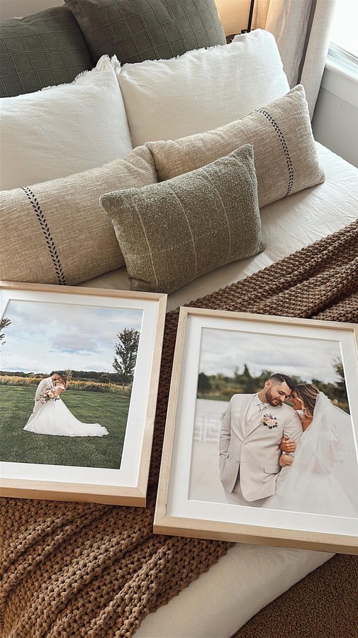 Instagram post by @happilyeverdanielle for Artifact Uprising. Caption reads: Finally adding wedding photos to our bedroom!🥹🖼️....