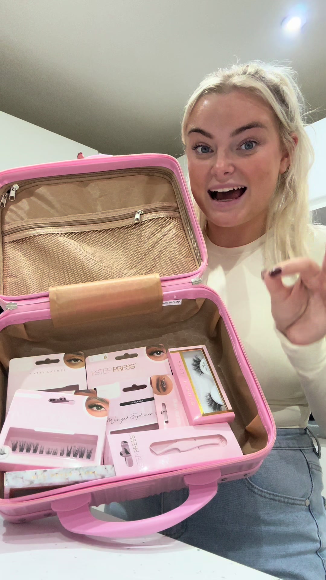TikTok post by @megan_beasley1 for TATTI LASHES. Caption reads: [...] of lashes with 50% off! 🤩 @TATTI LASHES....