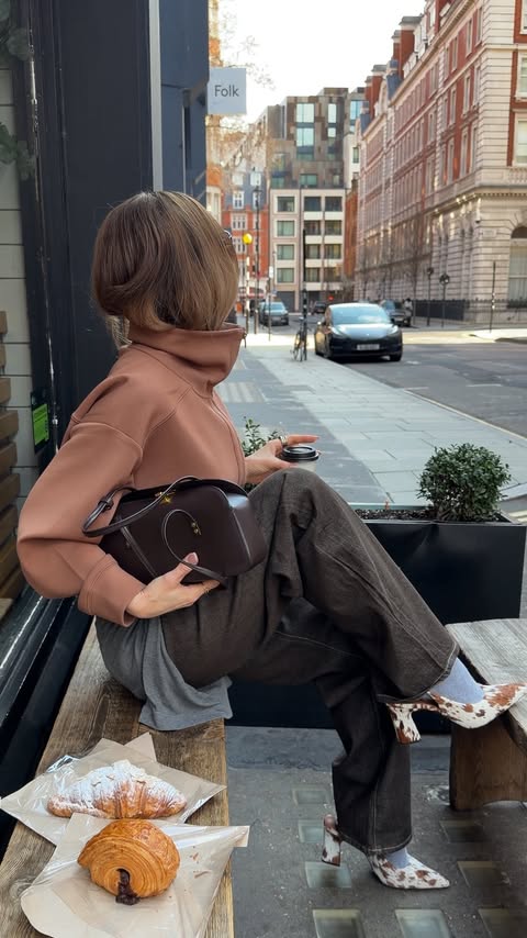 Instagram post by @whatgigiwears for Reiss. Caption reads: [...] you team barrel, wide leg, or straight?....