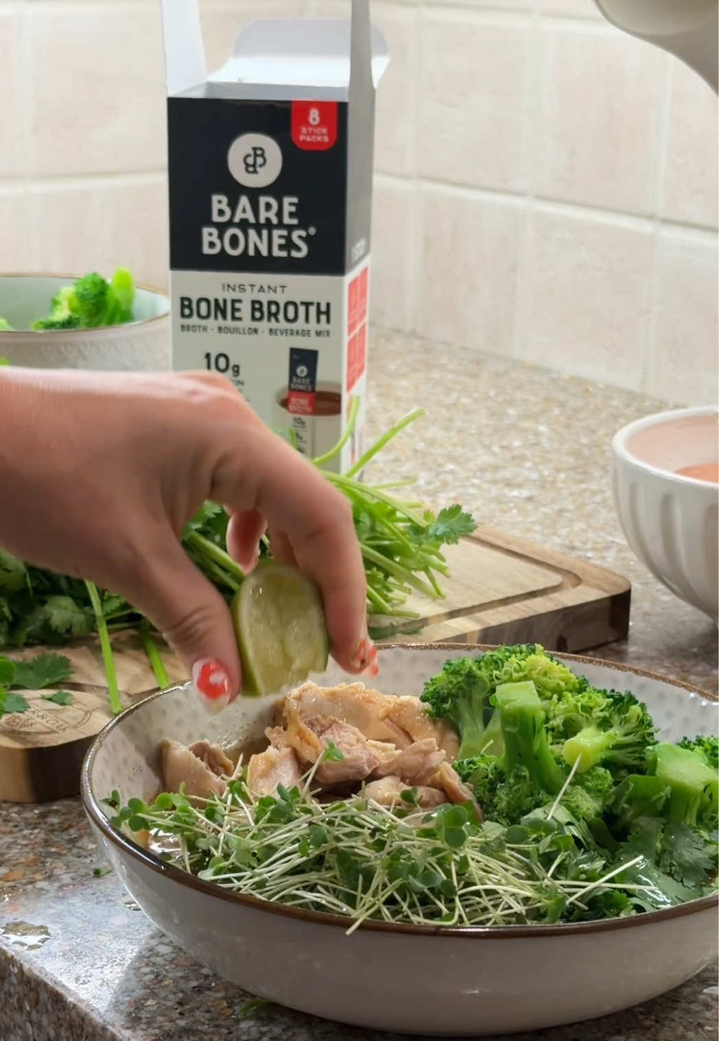 TikTok post by @beautyandthebeaker for Bare Bones. Caption reads: Love adding @Bare Bones Brand to my homemade pho....