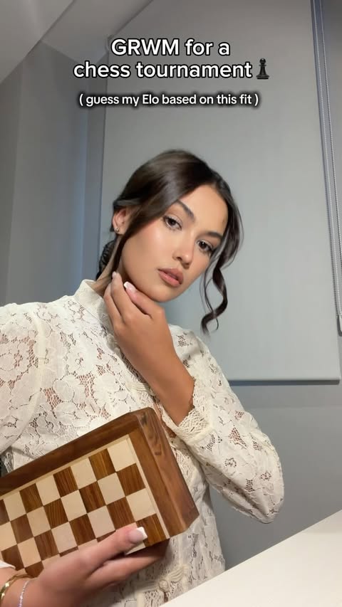 Instagram post by @baiguzhina_alina for Maje. Caption reads: Guess ⬇️👀 Outfit : blouse @majeparis jewellery....