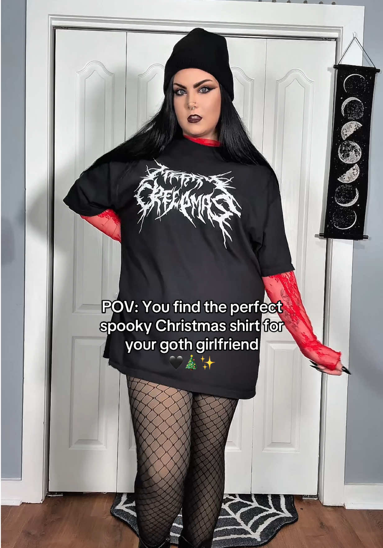 TikTok post by @nikkidrinkscraft for In Stitches Apparel. Caption reads: [...] in your life for creepmas? This @In Stitches....