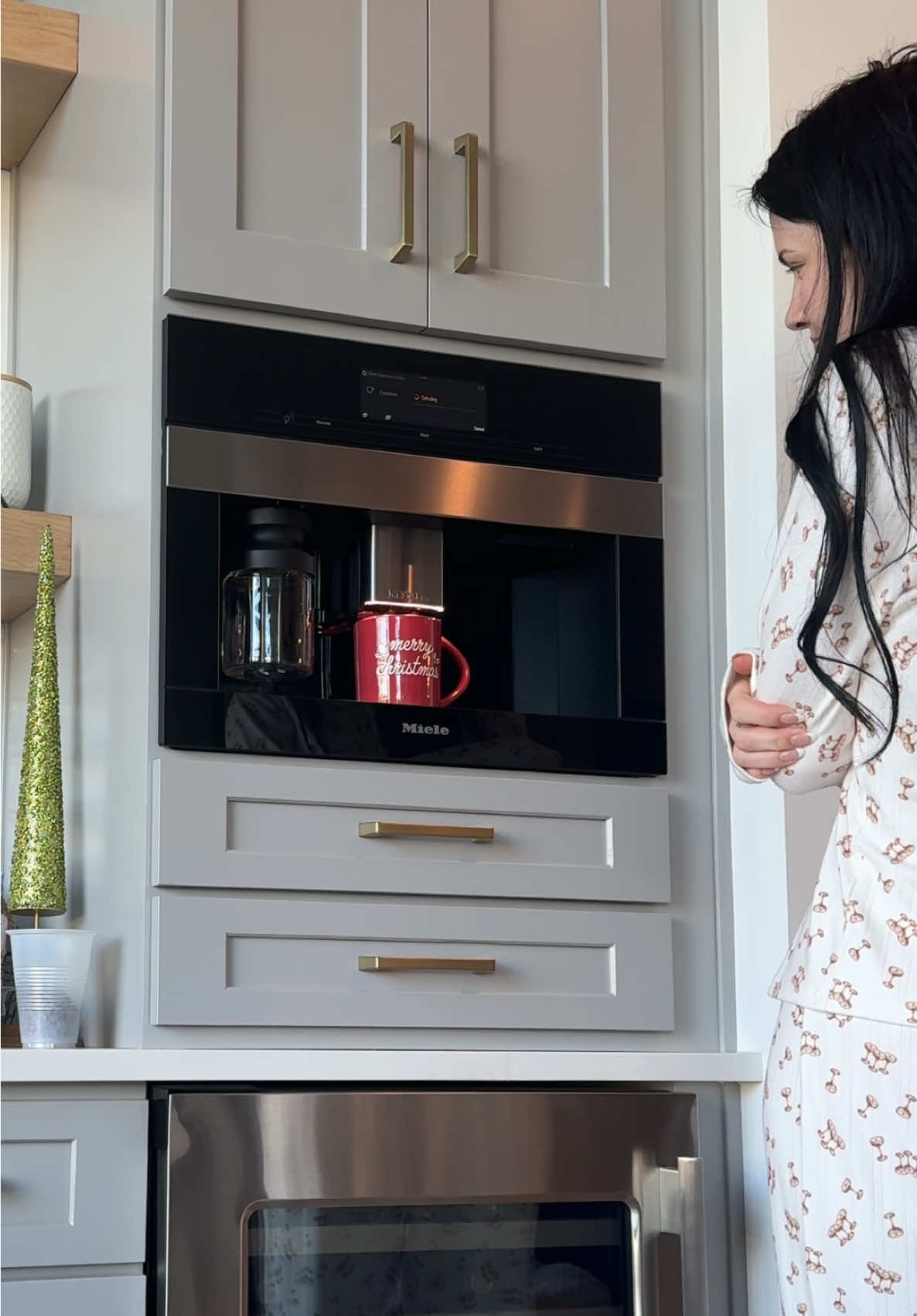 TikTok post by @hadley.huber for Miele. Caption reads: It’s like having a whole barista in your wall!  ....