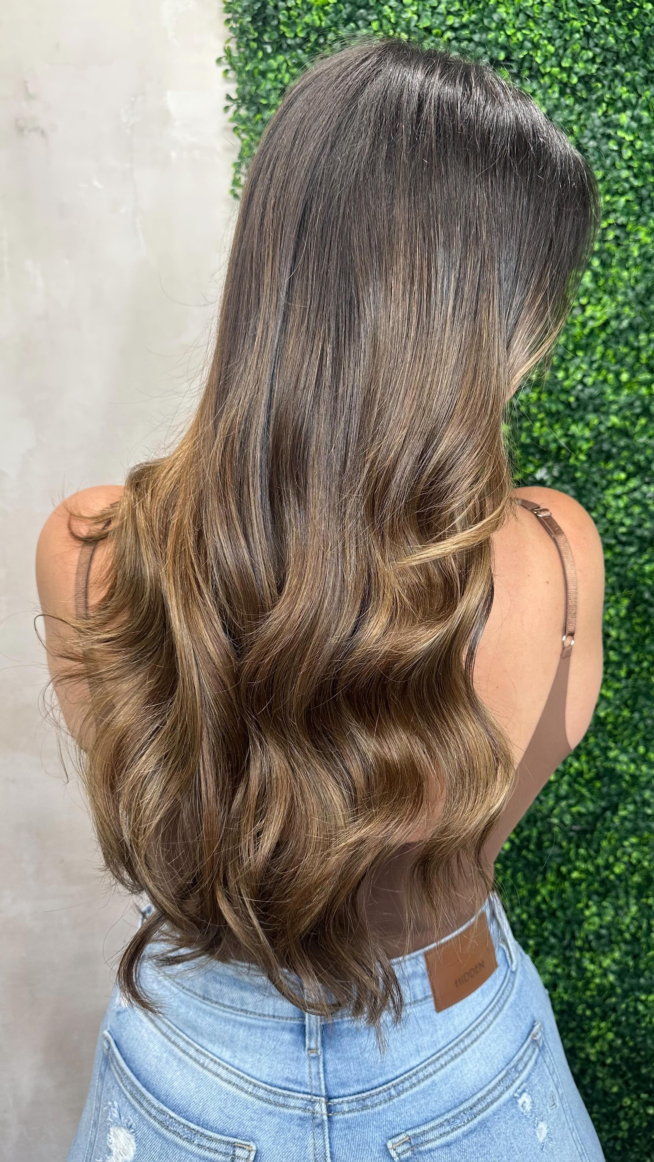 Instagram post by @omgartistry for Donna Bella Hair. Caption reads: We’ve all had that moment where you check your....