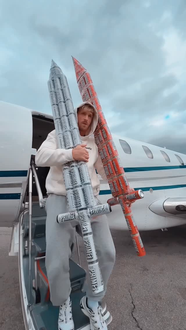 Instagram post by @moreloganpaul for DrinkPrime. Caption reads: duel wielding @prime PRIME energy is 18+....