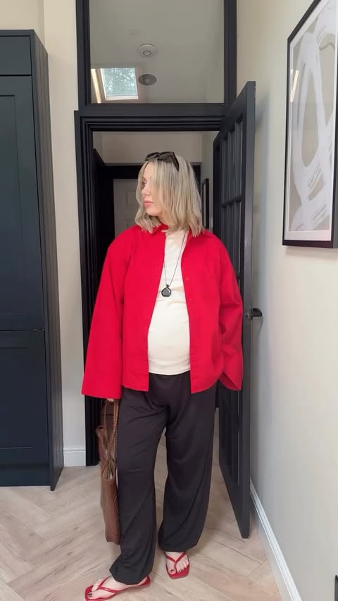 Instagram post by @lyds_wardrobe for NA-KD. Caption reads: [...] ❤️ Red shirt, brown bag and pendant all....