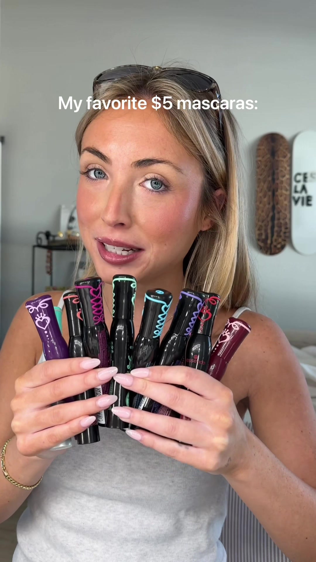 TikTok post by @katie.org for Essence Cosmetics. Caption reads: [...] !! #fyp #mascara #affordablemakeup @essence....