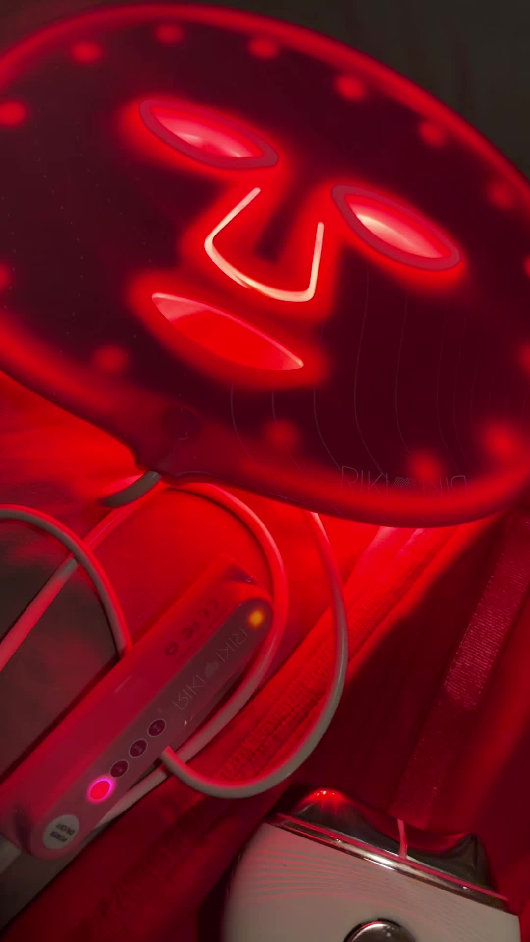 TikTok post by @glowupwithesther for RIKI LOVES RIKI. Caption reads: [...] Light therapy mask and guasha from....