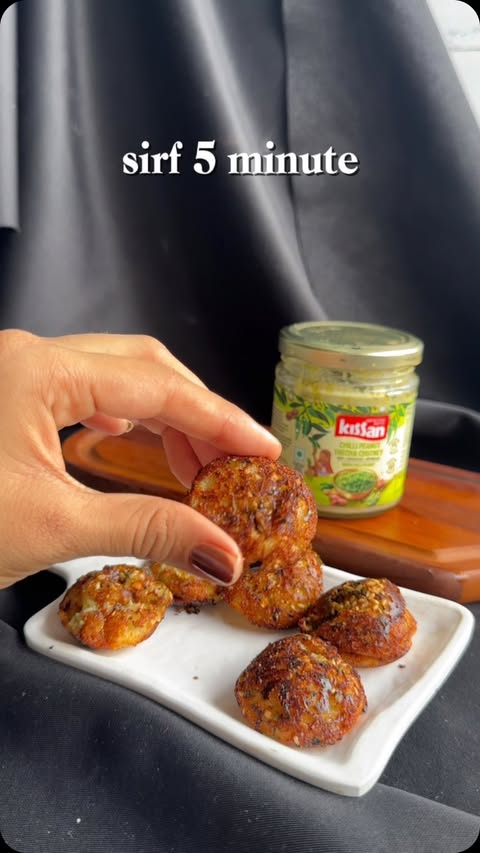Instagram post by @thetastyelements for Kissan. Caption reads: [...] cheesy goodness! 🌶️🧀🔥 The secret? Kissan....