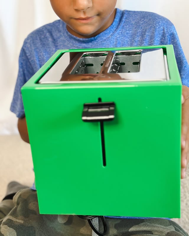 Instagram post by @cinthiacjensen for Toynk. Caption reads: [...] out the ultimate Minecraft toaster from....