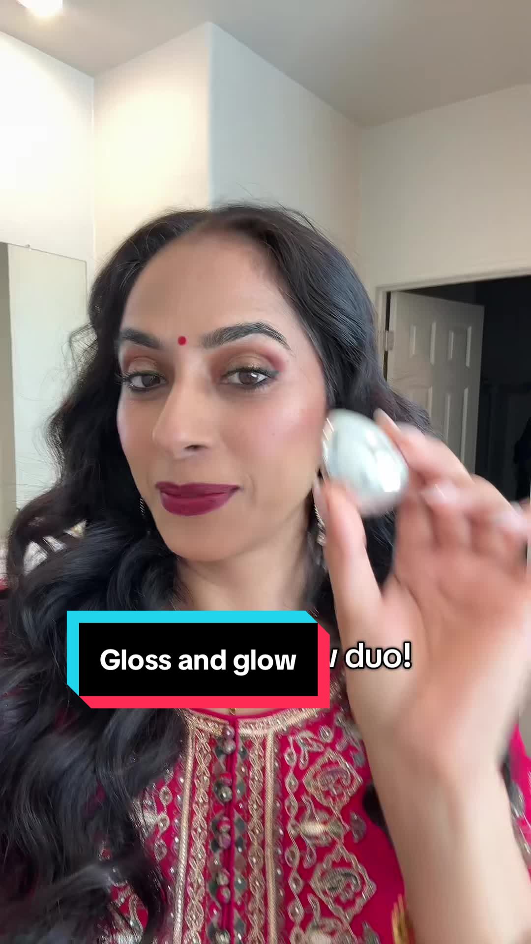 TikTok post by @geeta.sougu for Godmode Beauty. Caption reads: [...] #fyp #glowyskin #makeup @GODMODE BEAUTY.