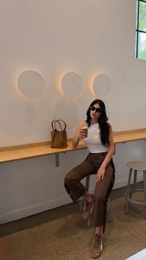 Instagram post by @im._.soniamahmoudieh for DSW Designer Shoe Warehouse. Caption reads: Soft tones tones, sunny days 🥥☀️ @dsw #AD #dsw....