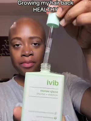 TikTok post by @ny.ringgold for Divi Scalp & Hair Health. Caption reads: And it’s NOT greasy! @DIVI #scalpcare #hairgrowth....