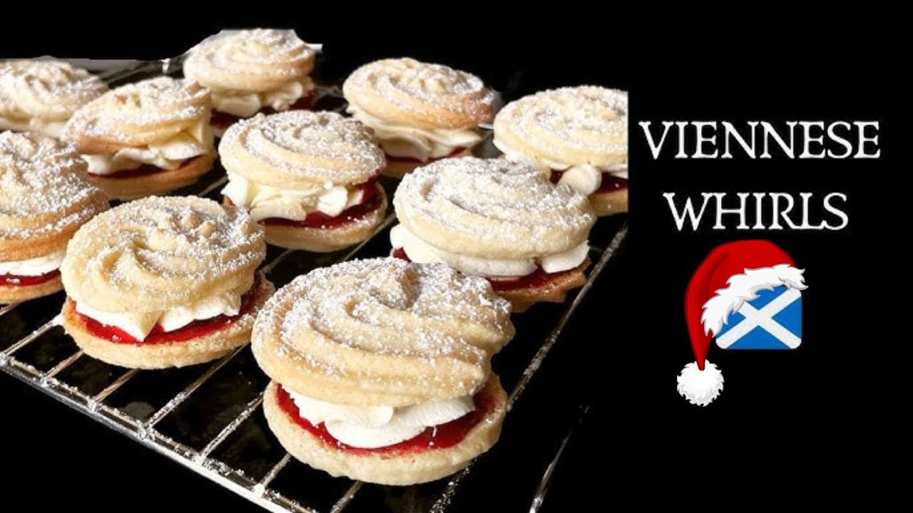 YouTube post by @WhatsForTea for Degusta Box. Caption reads: Viennese Whirls | Mr Kipling Recipe | Melting....